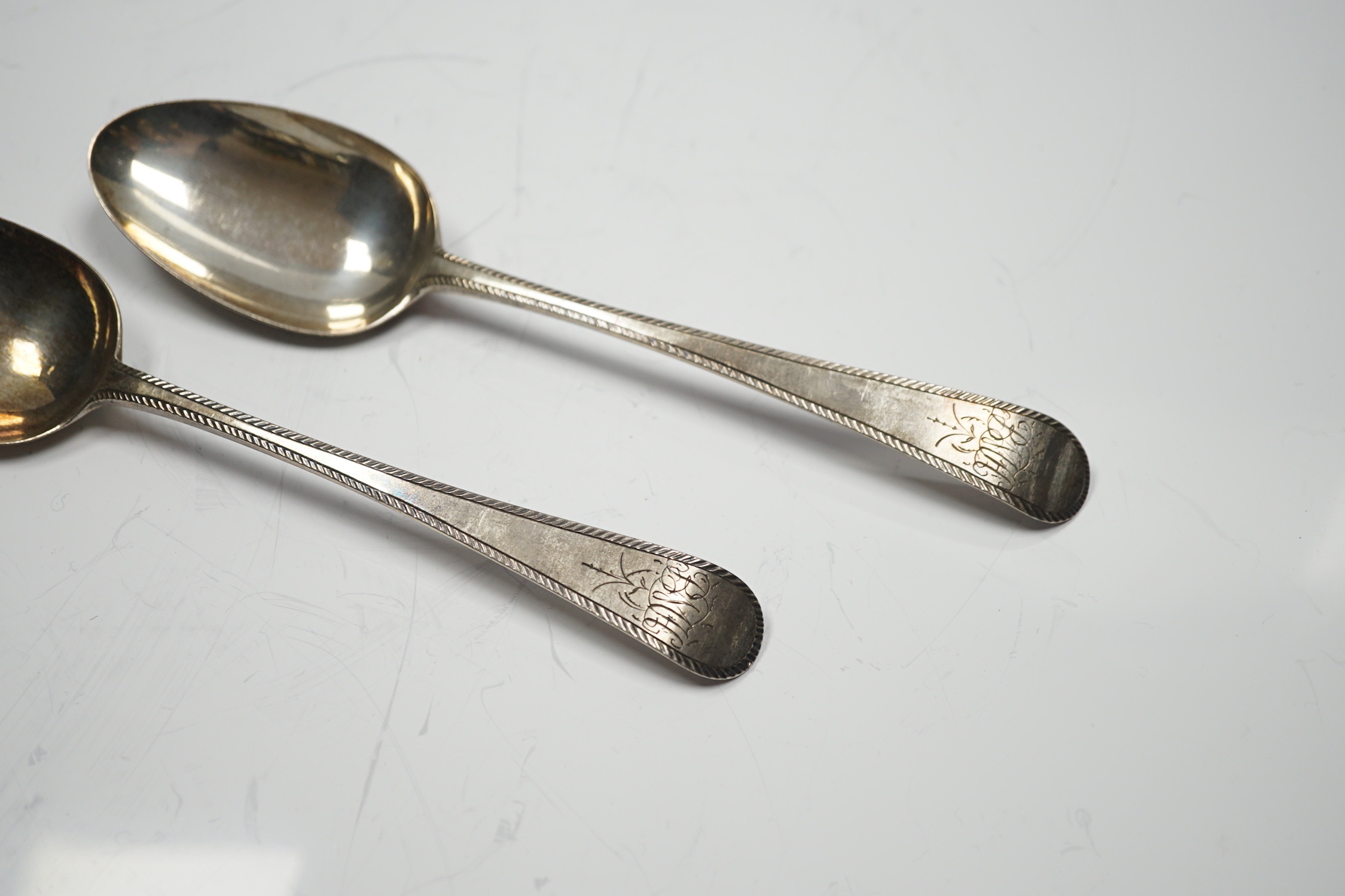 A pair of George III silver feather edge Old English pattern table spoons, by Hester Bateman, London, 1778, 21.4cm, 4oz.